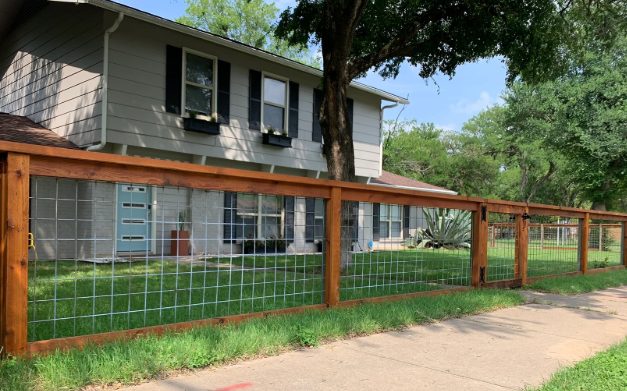 Wood-framed hog wire ranch fence by ProGuard Fencing