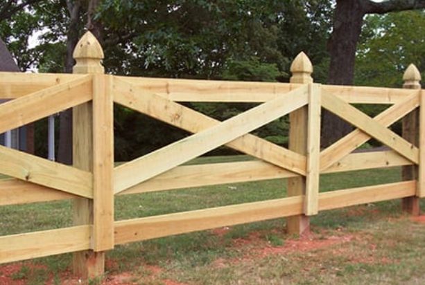 Crossbuck ranch fence with finial posts by ProGuard Fencing