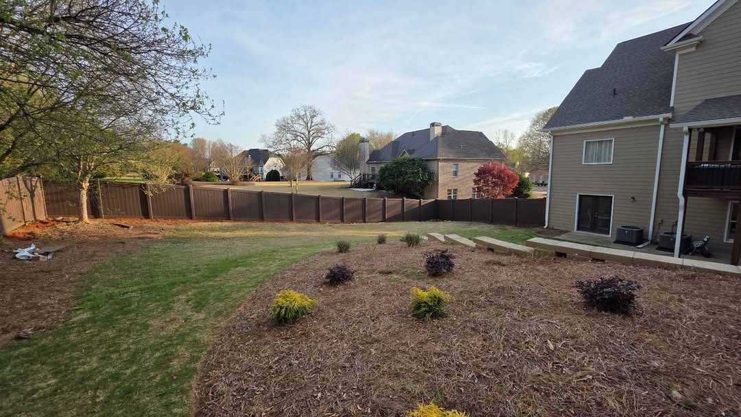 Vinyl privacy fence installation