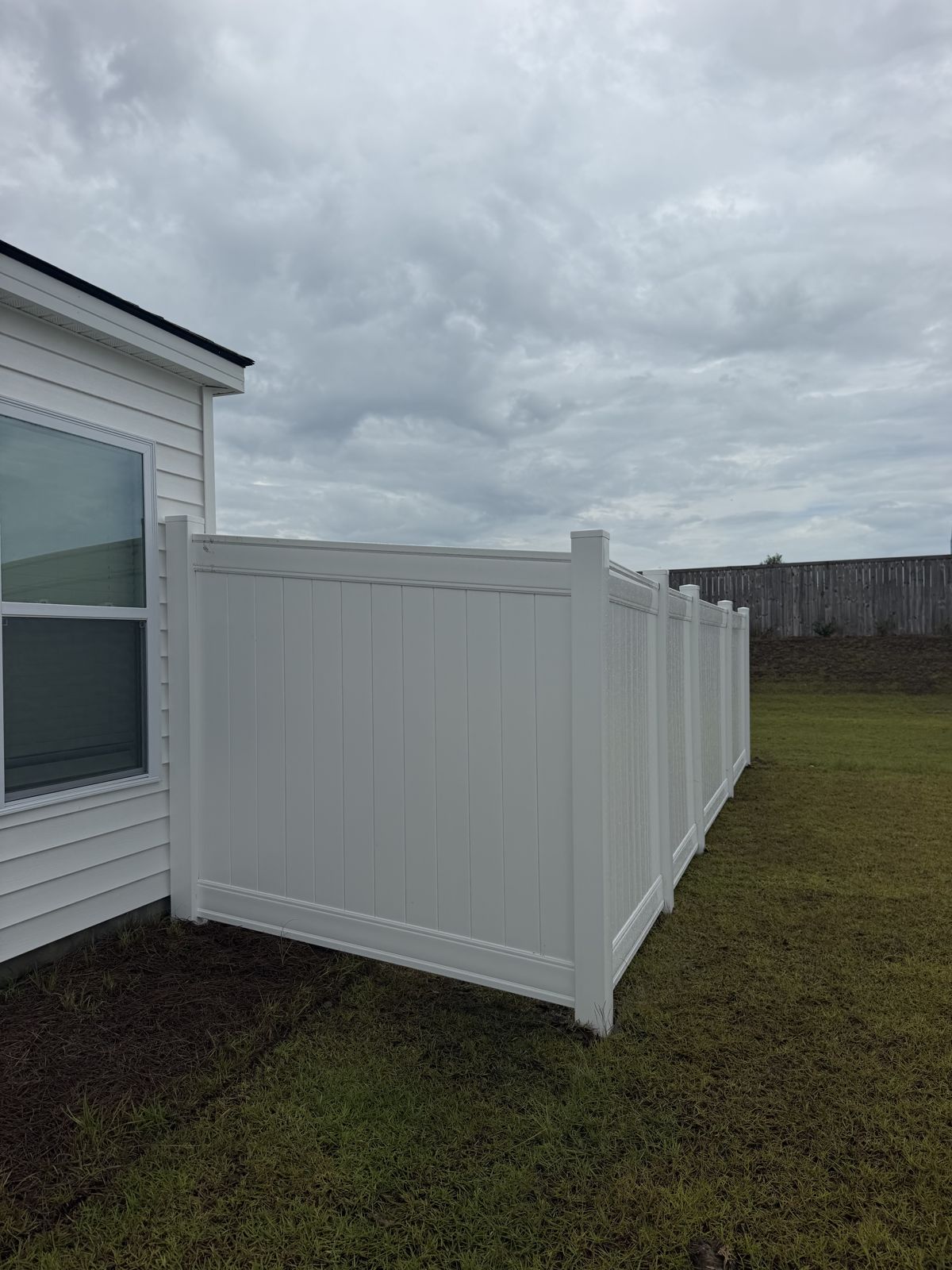 White vinyl privacy fence panels by ProGuard Fencing